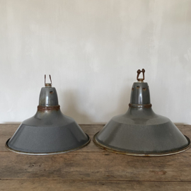 BU20110098 Set of 2 in size different, but colour-matched, French enamel outdoor lamp shades in grey. In beautiful weathered condition! Long hung in our plane trees .... Size: 35.5 cm & 30.5 cm. cross section / height +/- 23 cm.