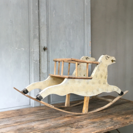 OV120110638 Old French wooden rocking horse from the 1960s in beautifully weathered earthy colors and in beautiful condition! / Size: 50 cm. high / 1 mtr. long. Pickup only.