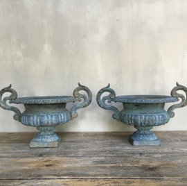 BU20110088 Set of 2 antique French cast iron garden vases in beautiful blue patina and condition.  Period: early 19th century. Size: 20.5 cm. high (to the brim) / diameter (up to "ears" ) 39.5 cm. Pick up only.