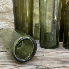 OV20111116 Set of 6 French antique hand-blown glass wine bottles in various beautiful shades of green with the so-called "spirit in the bottle base" in beautiful condition! Size: largest bottle 31 cm high / smallest bottle 25.5 cm high