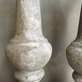 BU20110091 Set of 2 old French concrete balusters. Beautifully weathered clay color. The left baluster has an old crack on the base (see photo 7), by normal it won't be any problem. Size: +/- 61 cm. high / 15 wide. Pickup only!