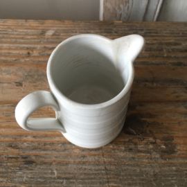 AW20110570 Small old French jar, missing an almost invisible glaze chip at the spout (see photo) further in beautiful condition! Dimensions: 7.5 cm. high / 5 cm. intersection