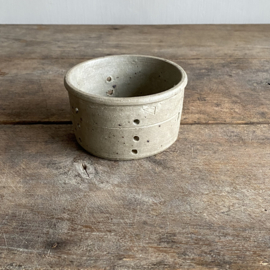 AW20111209 Old French goat cheese mold in beautiful clay color and condition! Size: 6 cm high / 10.5 cm cross section.