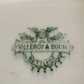 AW20110847 Old Belgian serving dish with beautiful details - stamp Villeroy & Boch Mettlach - In beautiful condition! Dimensions: 32.5 cm. long / 6.5 cm. high / 23 cm. intersection