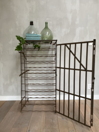 OV20110870 Old French iron wine rack with lockable door marked - Rigidex - Holds 100 bottles of wine. In beautiful condition! Size: 112 cm. high / 54.5 cm. wide / 56 cm. deep. Pick up only from store or delivery within NL for a fee.