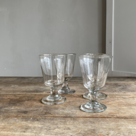 OV20110983 Set of four 19th century French wine glasses made of mouth-blown glass in perfect condition! Each with their own unique appearance. Size:  13,5 cm high / 8 cm cross section.