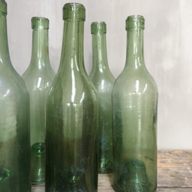 OV20110673 Set of 5 old French mouth-blown wine bottles with "the soul in the bottle" in beautiful light green color and condition! Size: 30 cm. high / 8 cm. cross section.
