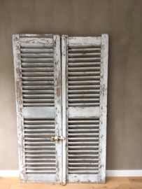 OV20110559 Old French shutters, beautifully weathered blue / gray Size: 2 m. high / 59.5 cm. wide (per part) Only pick up or delivery for a fee.