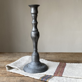 OV20110978 Antique French pewter candlestick holder. Beautiful high model, heavy duty and beautifully weathered by use. Size: 31.5 cm high / 12.5 cm cross section (base) / 5.5 cm cross section candle holder.