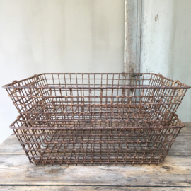 OV20110484 2 equal old French oyster baskets in beautifully weathered condition and stackable by tilting the handles inwards! Dimensions: 53 cm. long / 45 cm. wide / 15 cm. high. Price is per piece!