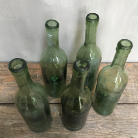 OV20110673 Set of 5 old French mouth-blown wine bottles with "the soul in the bottle" in beautiful light green color and condition! Size: 30 cm. high / 8 cm. cross section.