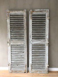 OV20110559 Old French shutters, beautifully weathered blue / gray Size: 2 m. high / 59.5 cm. wide (per part) Only pick up or delivery for a fee.