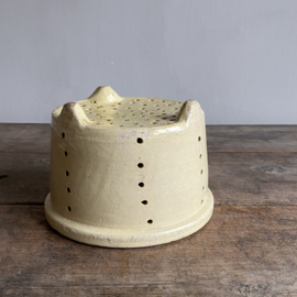 AW20111207 Large antique French goat cheese mold in beautiful soft yellow and condition! Size: +/- 13 cm high / 18 cm cross section.
