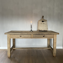 OV20110907 Antique French farmhouse table made of solid oak with 2 deep drawers, beautifully aged. Size: 1.64 mtr. long x 76 cm high x 83 cm. deep. Pick up in store or delivery within NL for a fee.