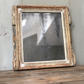 OV20110496 Beautifully weathered antique French mirror. The profile of the frame is made of wood with a pâte layer and has beautiful sleek colors! Dimensions: 37.5 cm. high / 37 cm. wide / 4 cm. fat.