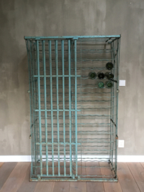 OV20110223 Unique old French iron wine rack with door on wheels in great aqua blue / green patina. It can contain 300 wine bottles, in beautiful condition! Size: 1.66 mtr. high / 57 cm. deep / 1.03 mtr. wide. Only pick up or deliver for a fee
