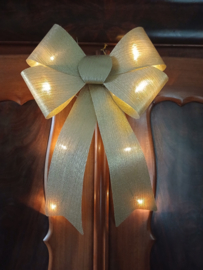 Goudkleurige strik met verlichting