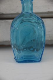 Vintage oud blauw glazen flesje Horse shoe