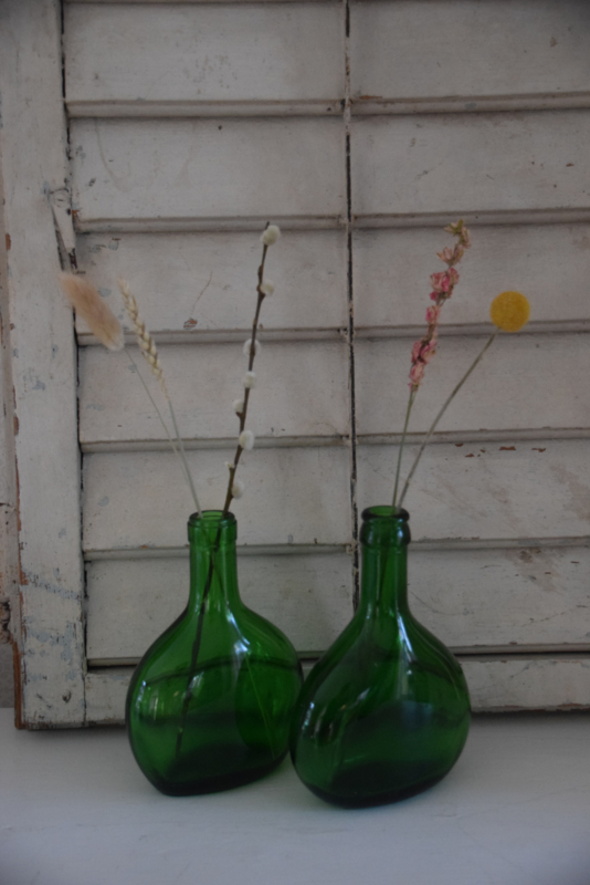 Setje groene glazen flesjes