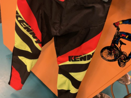 Kenny Elite BMX Wedstrijd Broek, Zwart/Rood/Geel, Youth 28, Gloednieuw