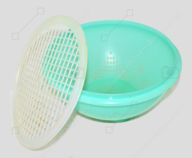 Jade green coloured vintage Tupperware colander with a white transparent grid
