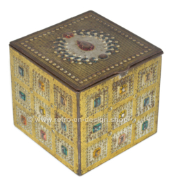 Vintage tin jewellery box in cube shape with details of gemstones