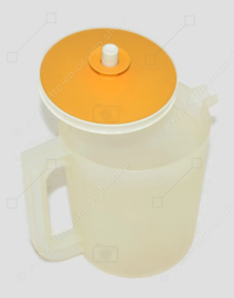 Vintage transparent Tupperware jug or pitcher with a yellow sealing lid, low model