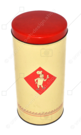 Cream-yellow tin biscuit canister made by Bolletje with a red lid.