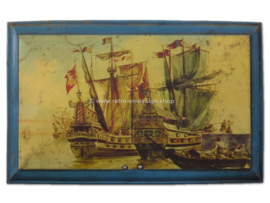 Vintage tin drum with old ships, galleons