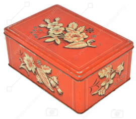 Vintage rectangular tin with a stylized floral pattern with leaf
