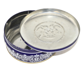 Round blue and white biscuit tin with cherubs, chubby child figure with wings