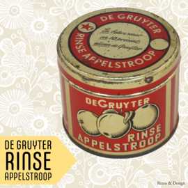 Rood met goudkleurige vintage blikken bus voor Rinse appelstroop van De Gruyter