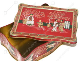 Lata de té vintage en rojo, verde, dorado y negro con imágenes orientales