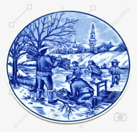 Porseleinen wandbordje van Royal Delft blauw handwerk, jaargetijde winter