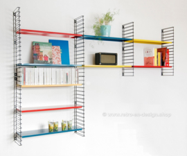 Retro Tomado wall rack in original red, blue and yellow colors from 1958