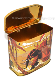 Vintage tea tin depicting an Asian elephant and rider