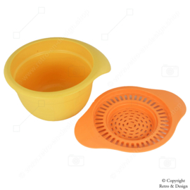Discover the convenience of this small Tupperware Bowl with Strainer!