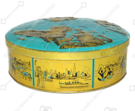 Vintage biscuit tin with a world map embossed on the lid