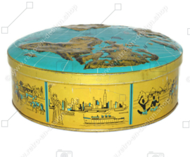 ​Vintage Keksdose mit einer auf dem Deckel geprägten Weltkarte