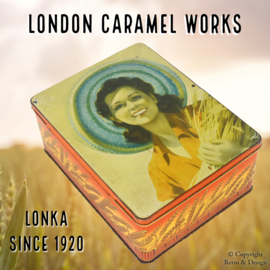 "Enchanting Lonka Storage Tin: A Vintage Symphony of Sweetness and Style"