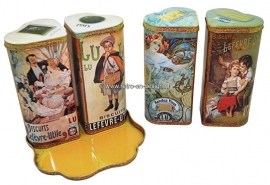 Conjunto de cuatro latas de galletas por LU, Lefèvre-Utile en un contenedor