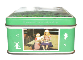 Groen vintage blik met kleurenfoto's "Mooi Holland"