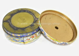 Vintage Albert Heijn round blue and white cookie tin with flower decorations.