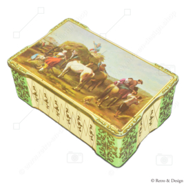 Rectangular tin with slightly scalloped sides with a haying scene and horses