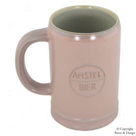 Jarra de cerveza vintage de Amstel: Una pieza atemporal de historia de los años 60