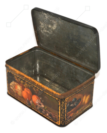 Vintage candy or cookie tin with still lifes of fruit pieces on all sides