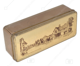 Gold-coloured tea tin or spoon box by Douwe Egberts with carriage and tea house