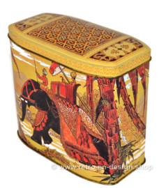 Vintage tea tin depicting an Asian elephant and rider