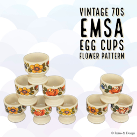 Set aus neun Vintage Emsa Eierbechern aus Kunststoff mit Blumenmuster