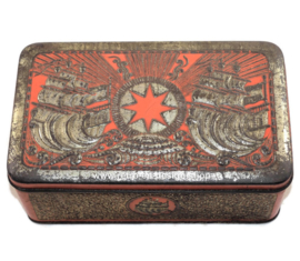 Tobacco tin in orange/gold with embossed decorations of ships for star-tobacco by Niemeijer